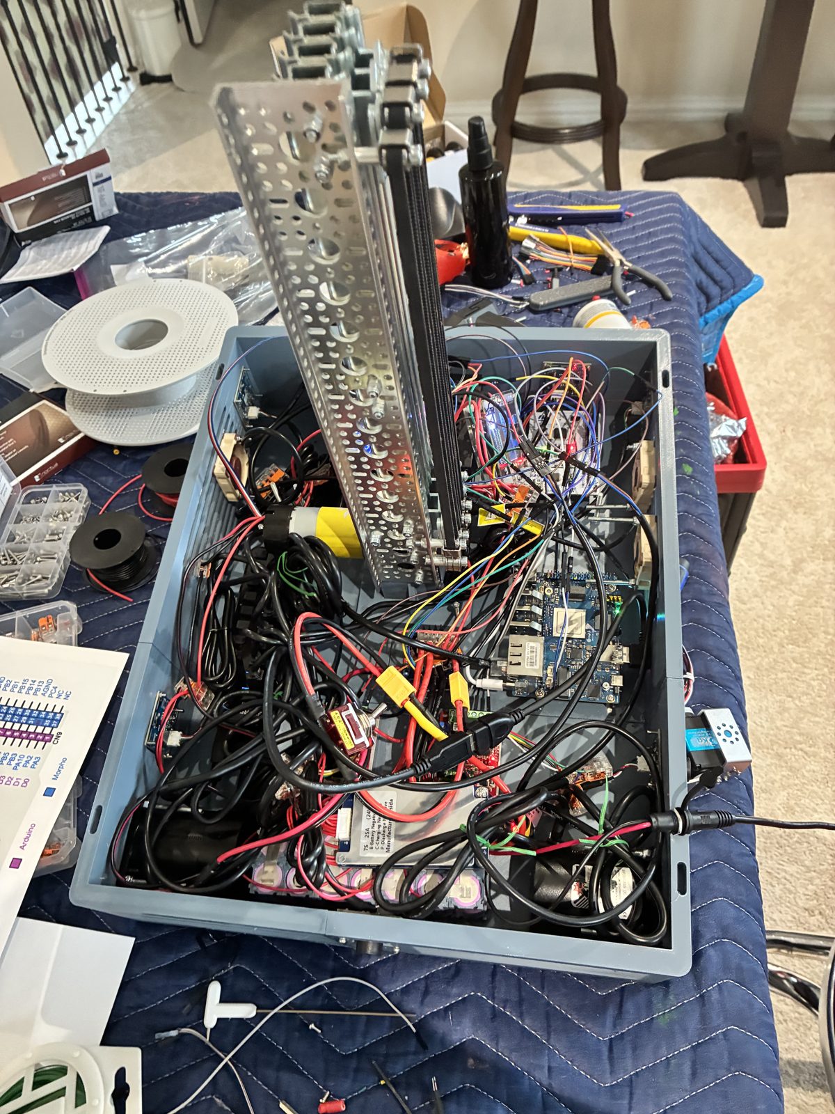 Inside SafePath: the chassis packed with wiring, boards, and the aluminum mast